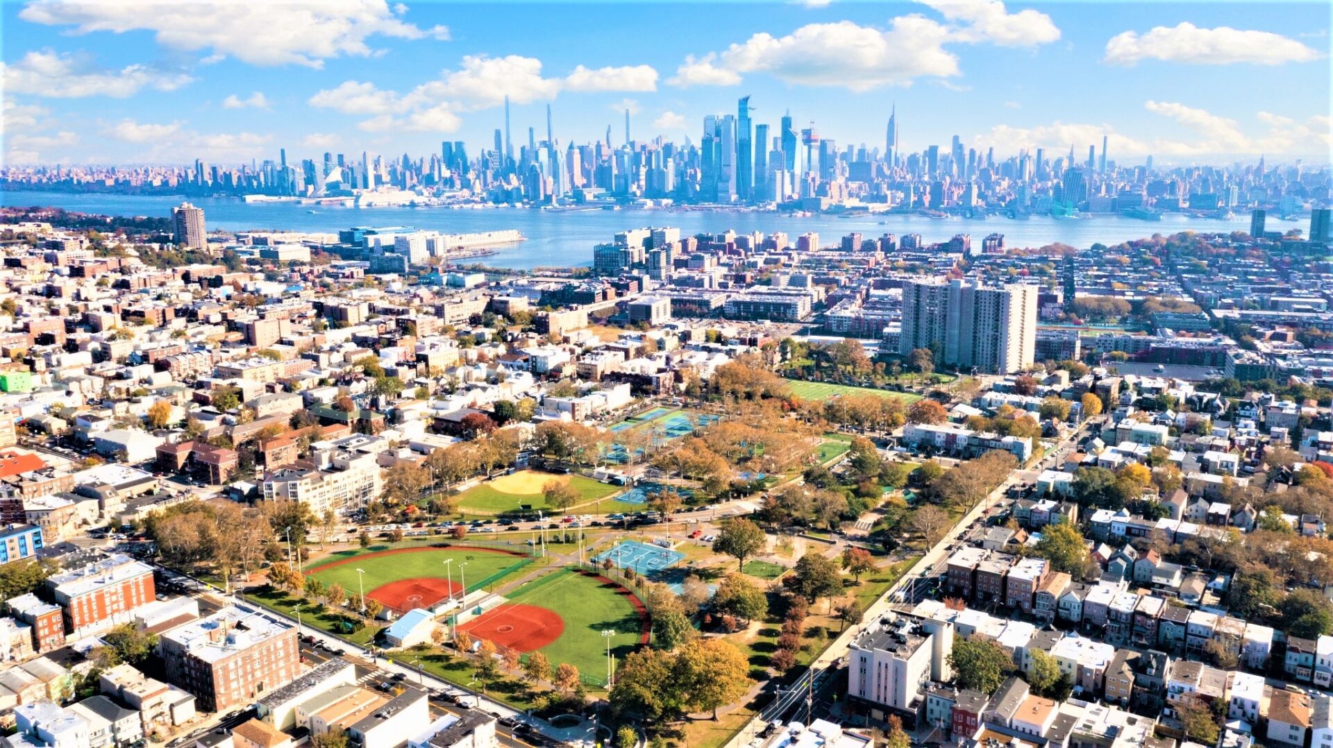 Aerial view over the Smart Start Academy area with Manhattan skyline beyond the river